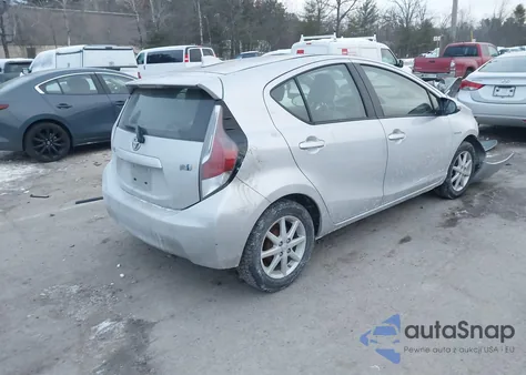 2015 Toyota Prius C Four from USA, damaged, VIN JTDKDTB37F1088893